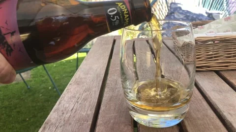 Poring Bottle of Beer Stock Footage 152992306