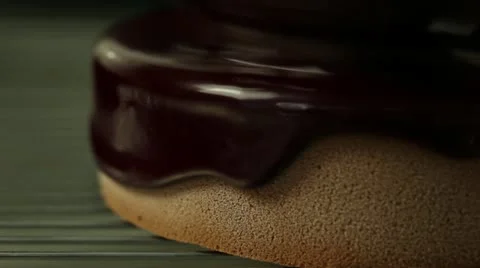 Poring chocolat over cake2 Stock Footage