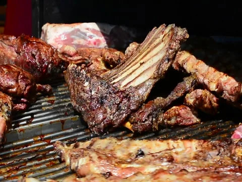 Pork and beef ribs are almost ready, rotate on the grill Stock Footage 89662727