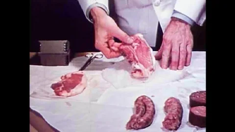 Pork is artificially digested to test for the parasite Trichinosis in the 1940s Stock Footage 101310949