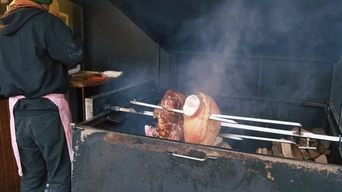 Pork is baked over a brazier. Stock Footage 71321800