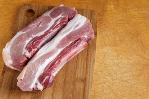 Pork belly on the left. Stock Photos