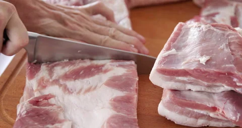 Pork belly preparing, cutting pieces Stock Footage 260540802