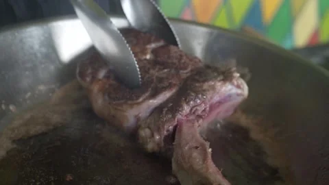 Pork on a bone. Beef steak on the bone, cooked on the grill. Stock Footage 155906160