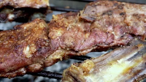 Pork breast on a grill ready to cut and serve. Stock Footage 293366017