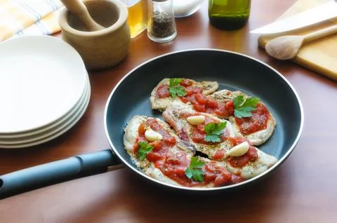 Pork chops with condiment in a paddle Fotos Stock