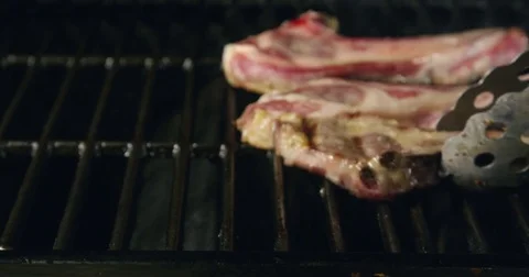 Pork Chops on the Grill with Flames 14 Stock Footage 84112087