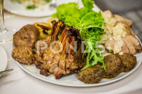Pork chops, meat patties and cold cuts Stock Photos
