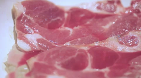 Pork on a frying pan Stock Footage 55659471