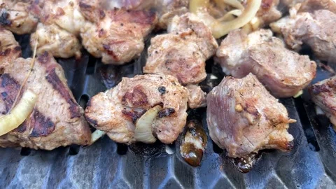 Pork is grilled on the grill Stock Footage 230630981