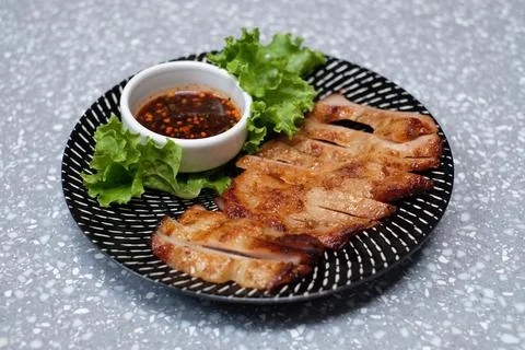 Pork grilled on marble table Stock Photos