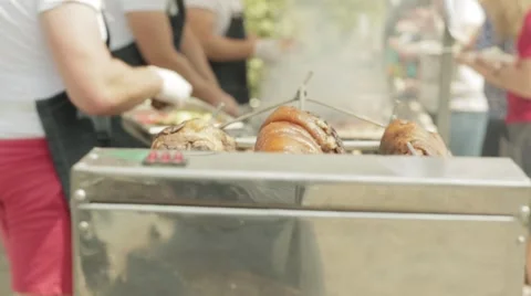 Pork ham roasted on an open fire Stock Footage 64260539