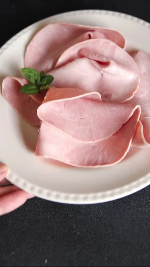 Pork ham sliced meat natural meat ingredient delicious snack gourmet dish Stock Footage 344989448