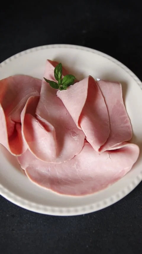 Pork ham sliced meat natural meat ingredient delicious snack gourmet dish Stock Footage 344989461