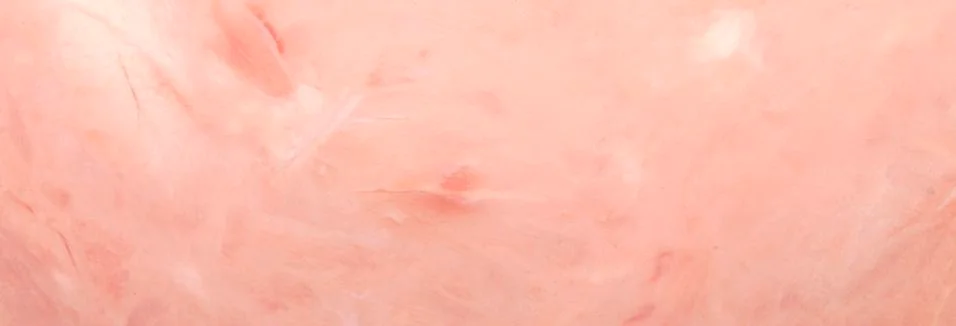 Pork ham.Ham background.The texture of the ham. Stock Photos