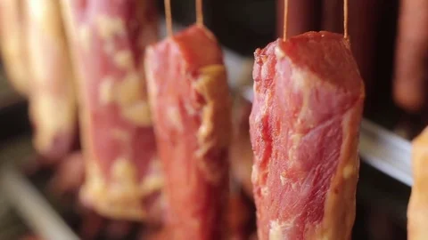 Pork hanging in the fridge, closeup Vídeo Stock 75242423