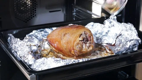 Pork knuckle on the baking sheet Stock Footage 85164191