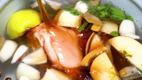 Pork knuckle instead of vegetables is cooked in a saucepan Stock Footage 249598567