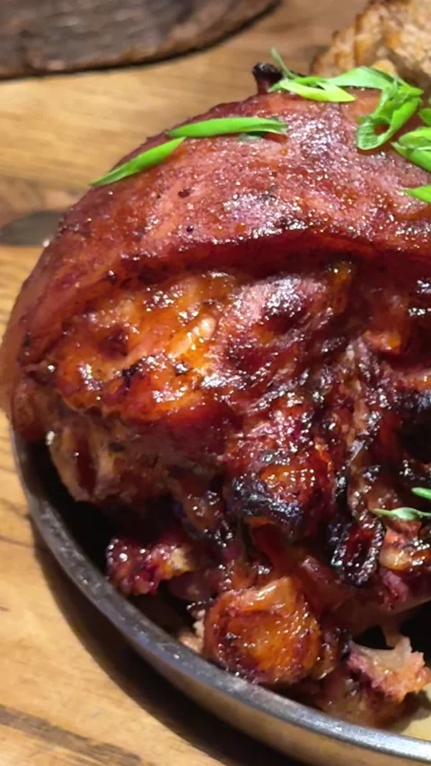 Pork knuckle with potatoes knuckle with crispy skin and roasted potatoes on a Stock Footage 326546461