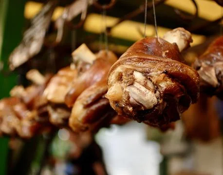 Pork knuckles on display Stock Photos