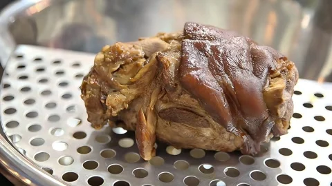 Pork knuckles in stainless bowl Video stock 272298367