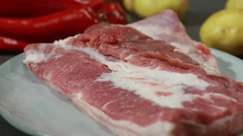 Pork meat and vegetables on the table Video stock 151351627