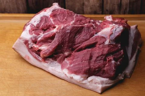 Pork meat with fat layer, side view. Stock Photos