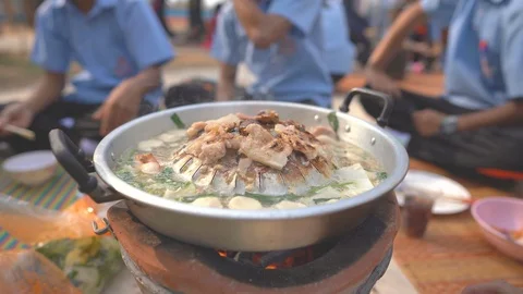 Pork meat grilled and roasted on pan for eating food of people in restaurant Vídeo Stock 122888022