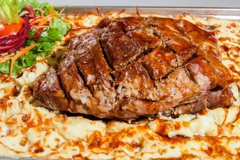 Pork neck with mashed potato Stock Photos