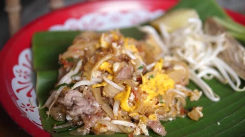 Pork Pad Thai on Banana Leaf Stock Footage 247392853