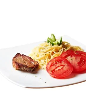 Pork with pasta Stock Photos