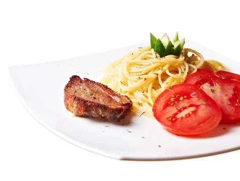 Pork with pasta Stock Photos