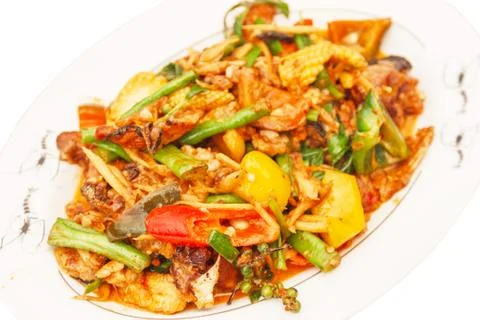 Pork in red curry paste Stock Photos