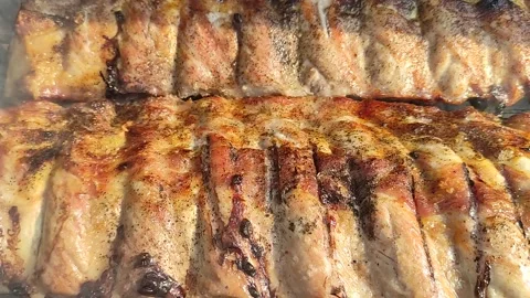 Pork ribs are fried and smoked on bbq grill. Stock Footage 154282653