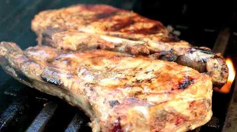 Pork ribs on a grill Stock Footage 50452233