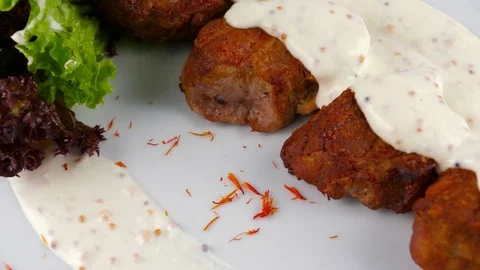 Pork roast in sauce, close-up view, served in Restaurant Stock Footage 80144877