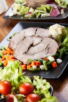 Pork roast with vegetable. selective focus. Stock Photos