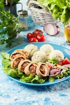 Pork rolls stuffed with mozzarella Stock Photos