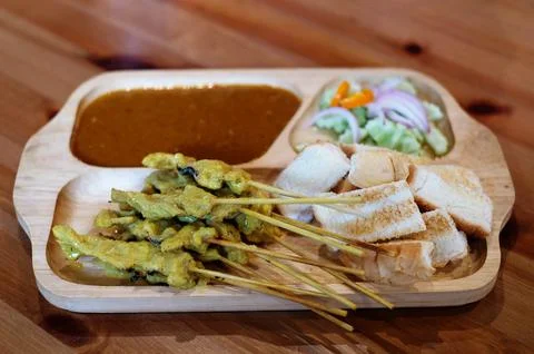 Pork satay set with roasted bread and sweet sauce Stock Photos
