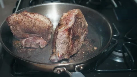 Pork shoulder cuts searing in a hot pan 스톡 동영상 337860180