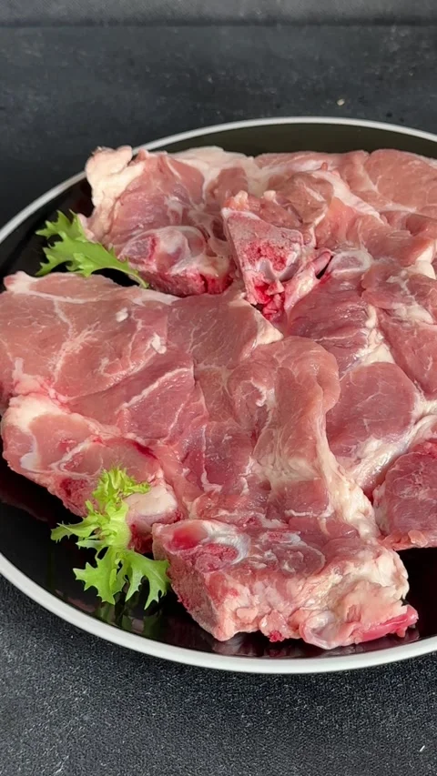 Pork steak raw meat lunch or dinner tasty snack fresh and delicious gourmet food Stock Footage 336679913