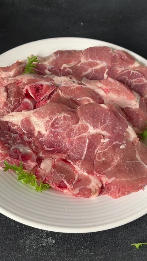 Pork steak raw meat lunch or dinner tasty snack fresh and delicious gourmet food Stock Footage 336679914