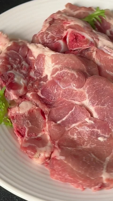 Pork steak raw meat lunch or dinner tasty snack fresh and delicious gourmet food Stock Footage 336679918