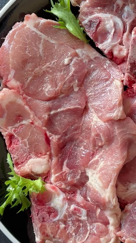 Pork steak raw meat lunch or dinner tasty snack fresh and delicious gourmet food Stock Footage 336679928