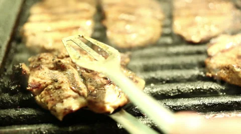 Pork steaks on barbecue grill Stock Footage 35120366