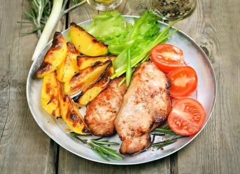 Pork steaks Stock Photos