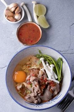 Pork Suki with Egg in Ceramic Cup Stock Photos