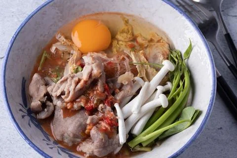 Pork Suki with Egg in Ceramic Cup Stock Photos