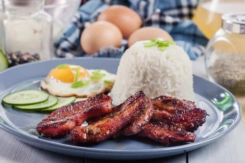 Pork tocino with rice and fried egg Stock Photos