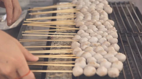 Porkballs sticks on grill Video stock 60112600